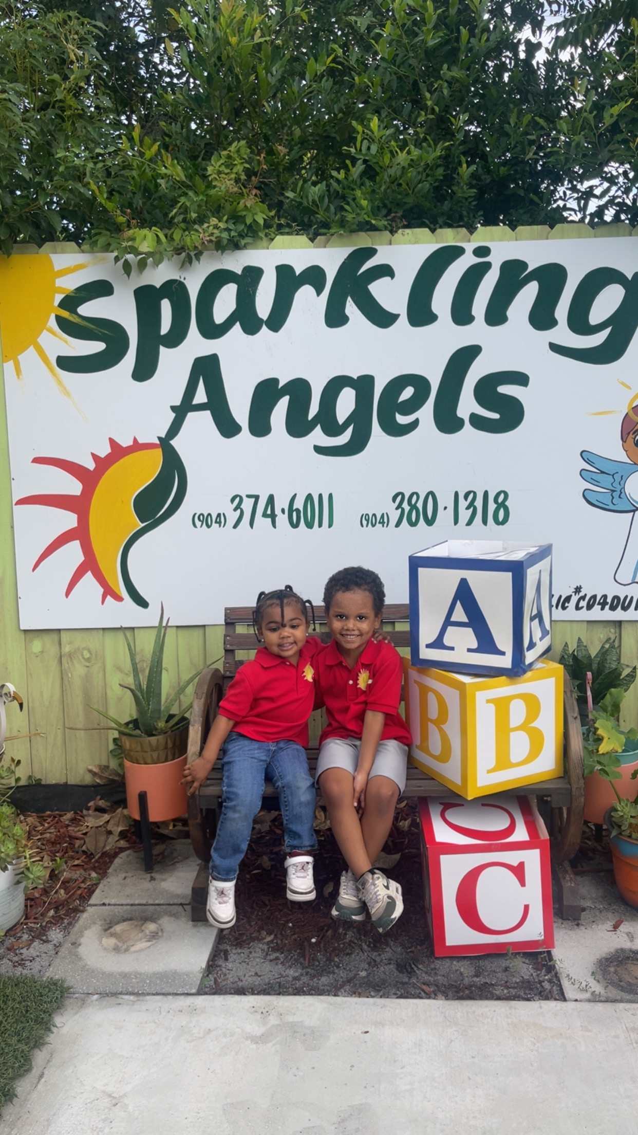 The small, suburban Sparkling Angels Daycare is pictured, with six children posing in the image. Parents looking for a lov...